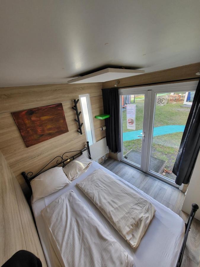 Cottage mit Doppelbett und Gemeinschaftsbad