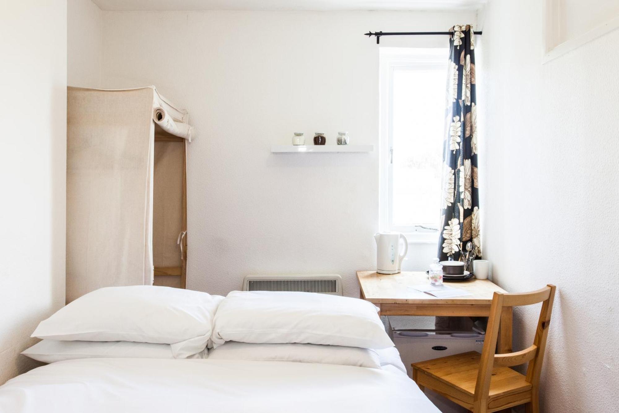 Small Single Room with Shared Bathroom