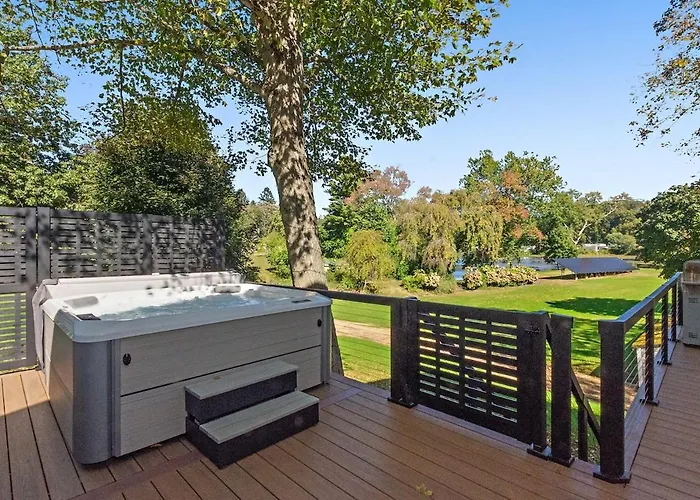 Modern Waterfront Retreat With Hot Tub & Pond Views
