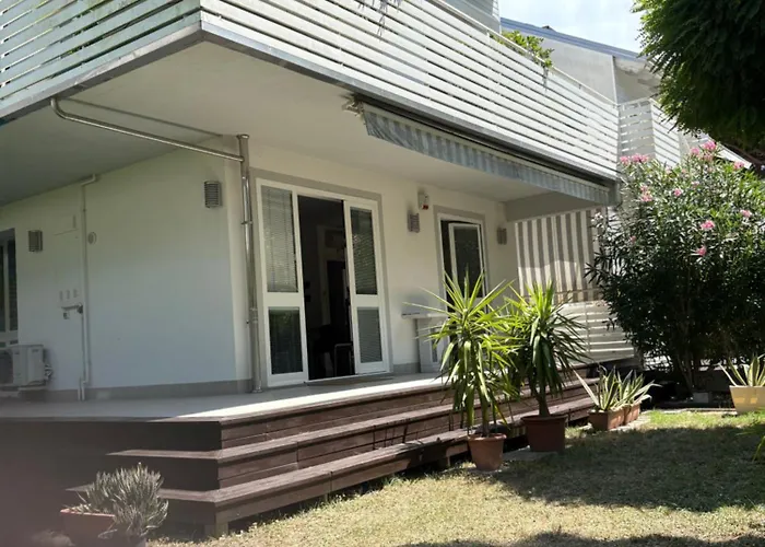 Casa con giardino